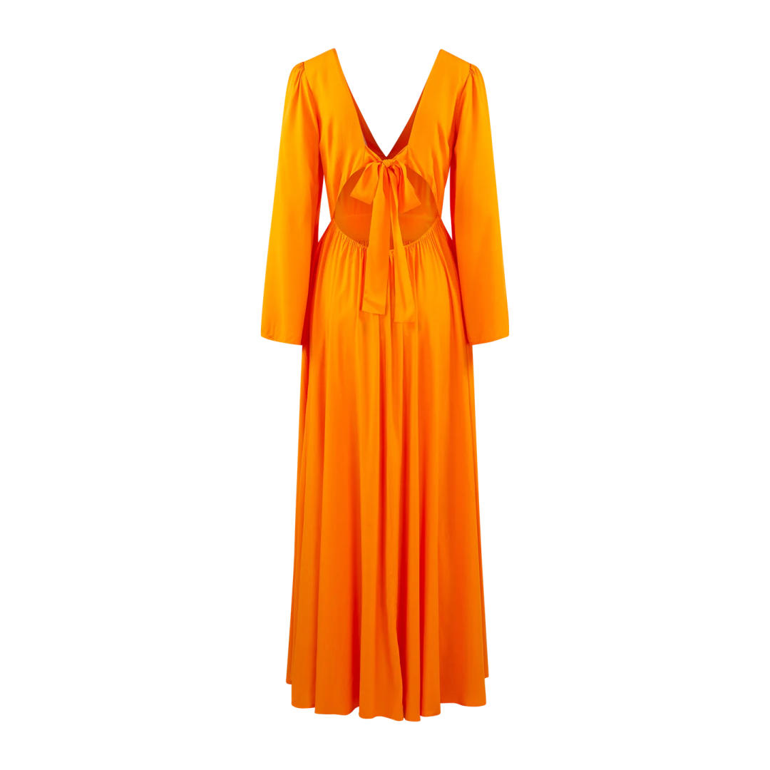 a woman in an orange dress