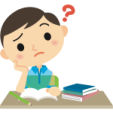 a boy sitting at his desk with a book