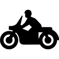 a silhouette of a person on a motorcycle