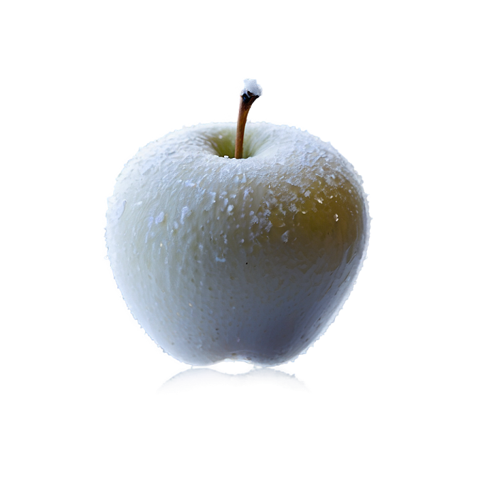 an apple covered in water on a white background