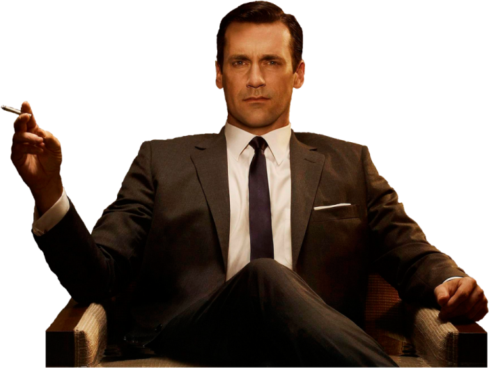 a man in a suit smoking a cigarette
