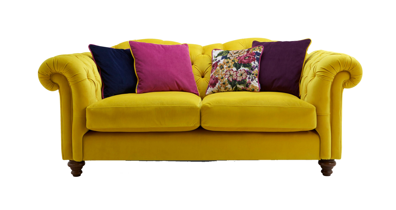 a yellow couch with colorful pillows on it