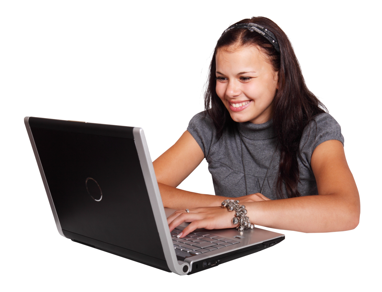 a young woman is typing on her laptop