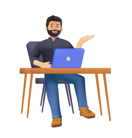 a man sitting at a desk with his laptop