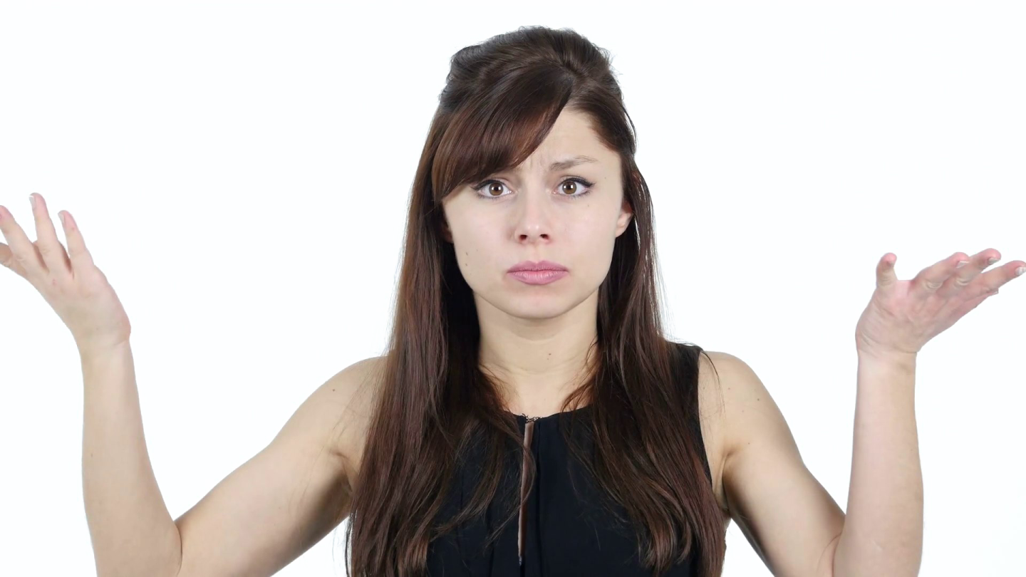 a woman holding her hands up in the air