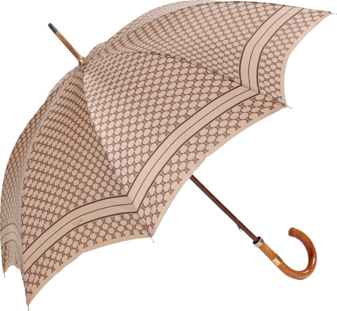 a brown and white umbrella with a wooden handle