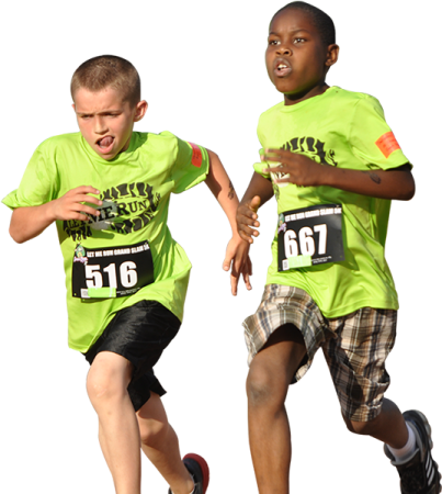 two young boys running in a race