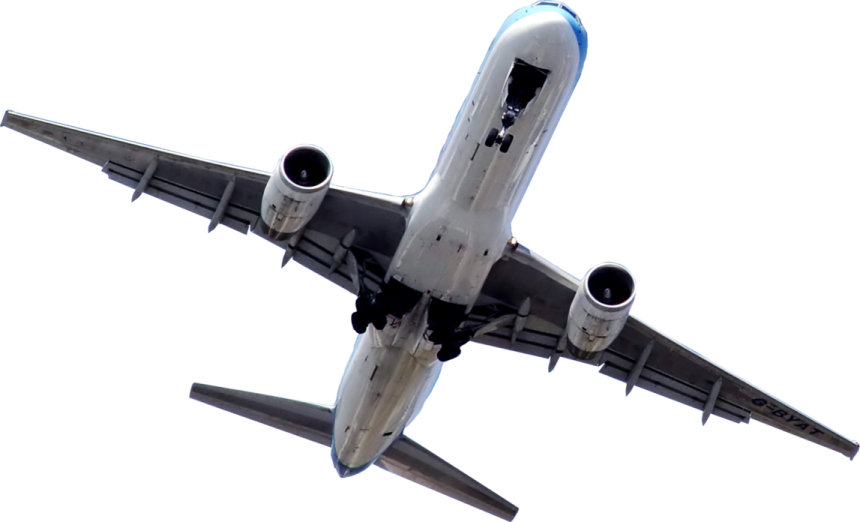 an airplane flying in the sky with its landing gear