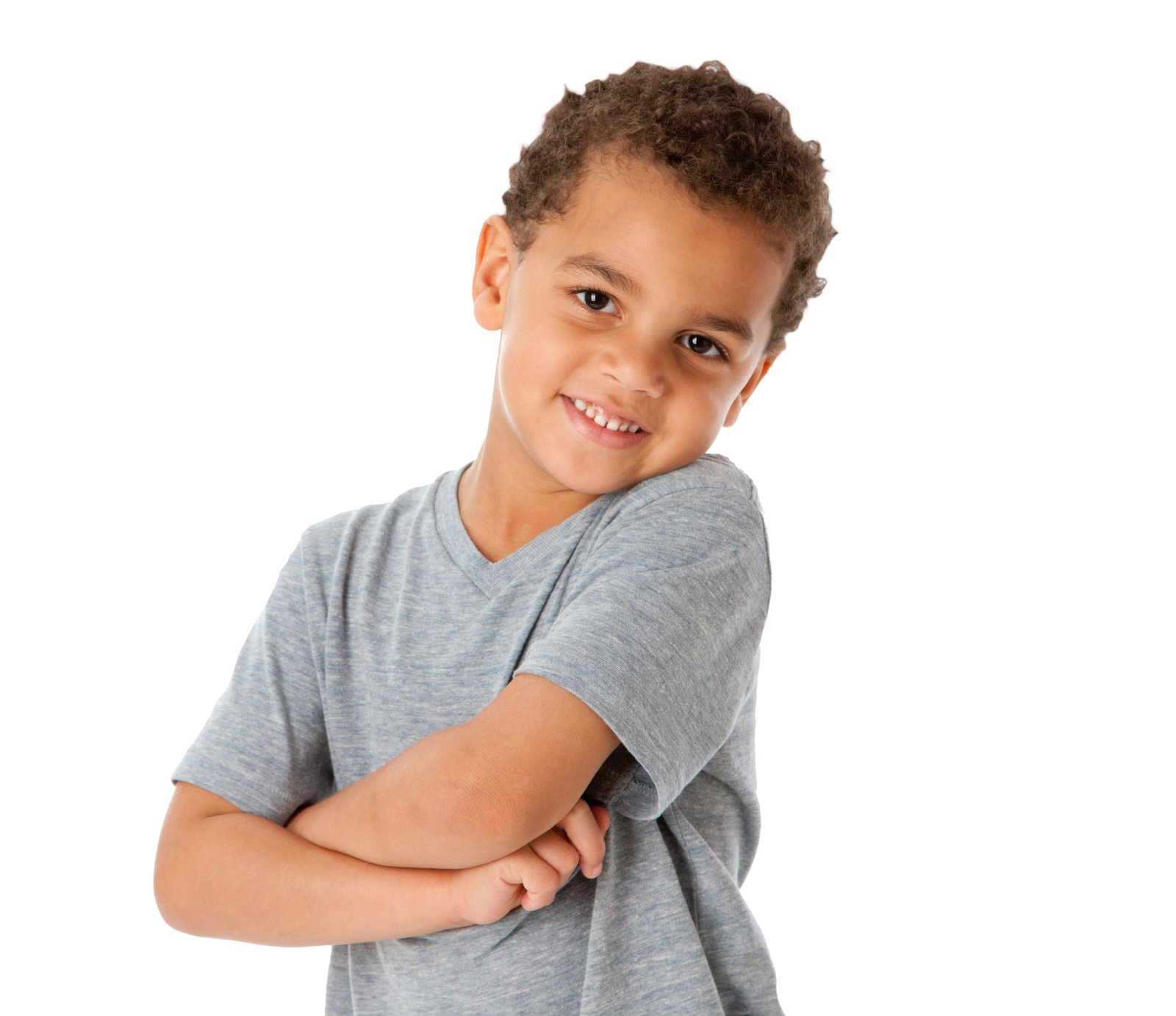a young boy standing with his arms crossed