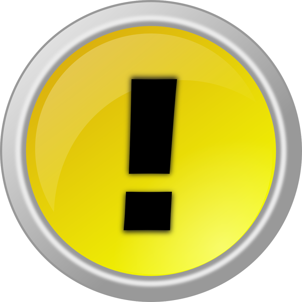 a yellow button with the letter i on it