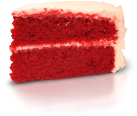 a piece of red velvet cake with white frosting