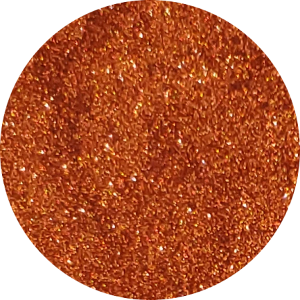 an orange colored glitter in a circle