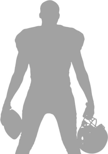 a silhouette of a football player holding a ball