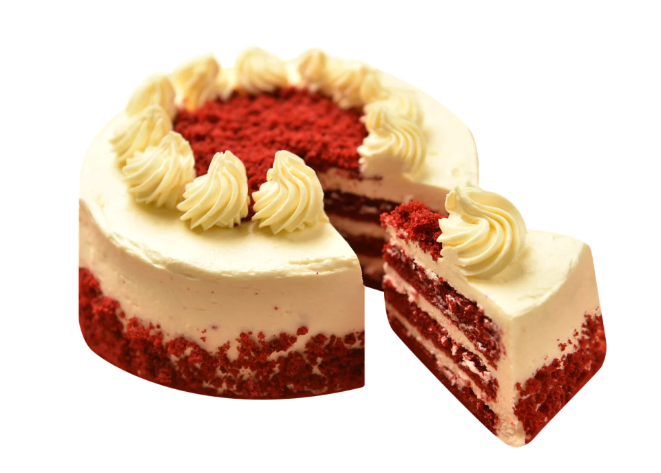 a red velvet cake with white frosting on top