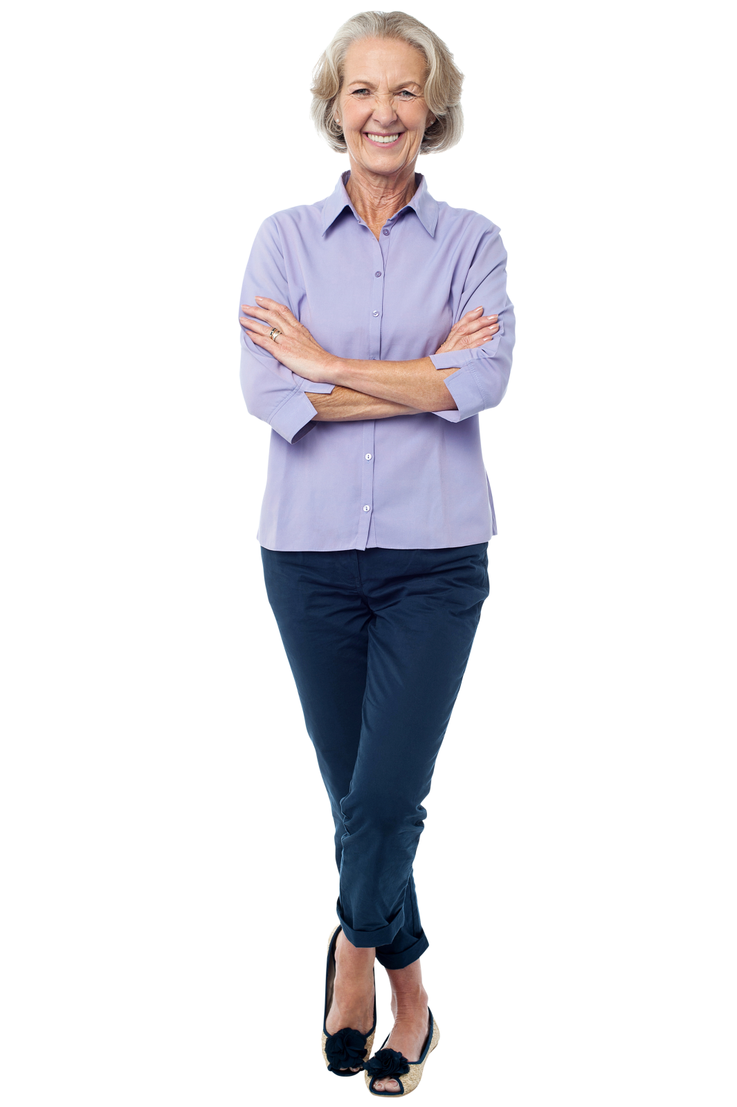an older woman standing with her arms crossed