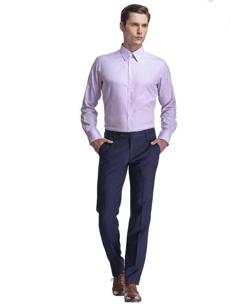 a man in a purple shirt and blue pants