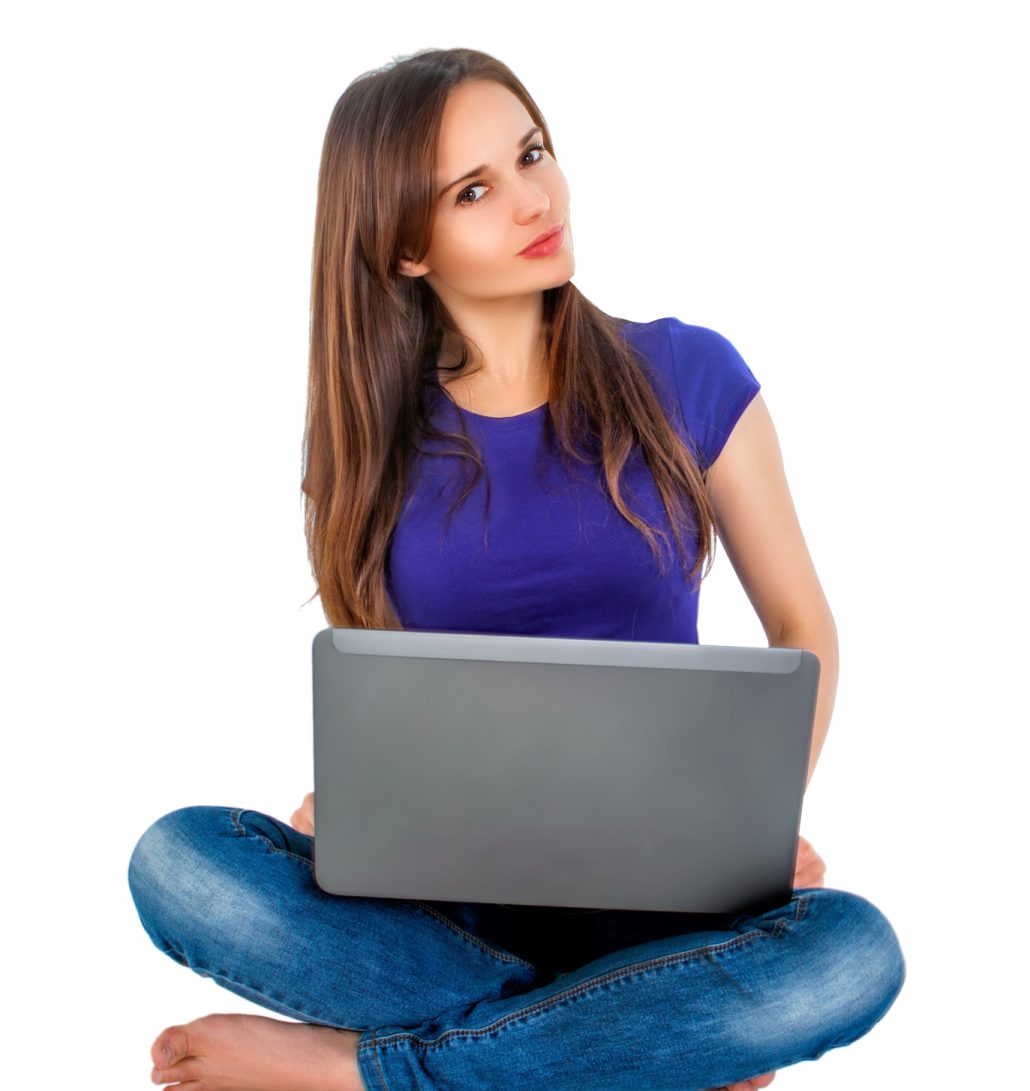 a woman sitting on the floor with her laptop
