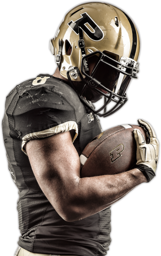 a man holding a football ball in his hands