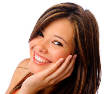 a woman with long brown hair smiles at the camera