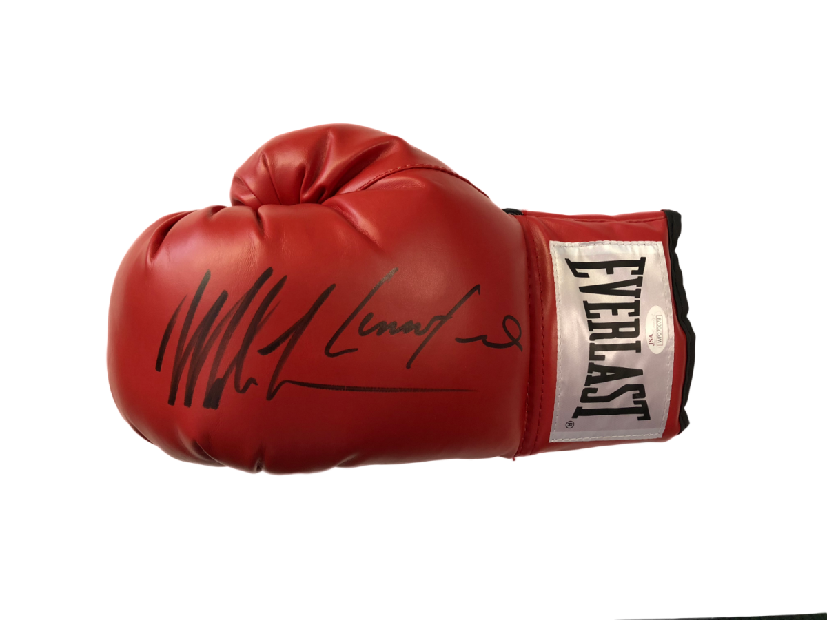 a pair of red boxing gloves with signed signatures
