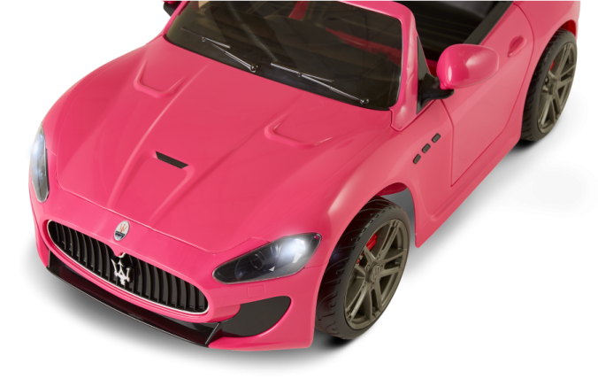 a pink toy car on a white background