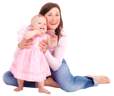 a woman holding a baby in her arms