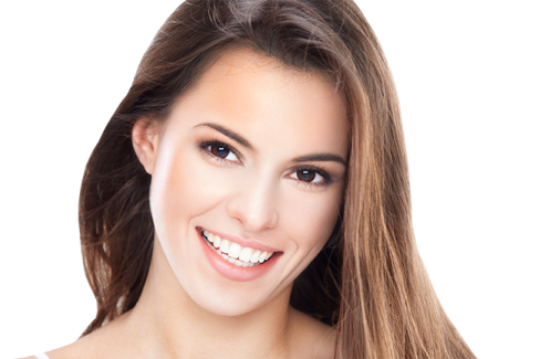 a woman with long brown hair smiling at the camera