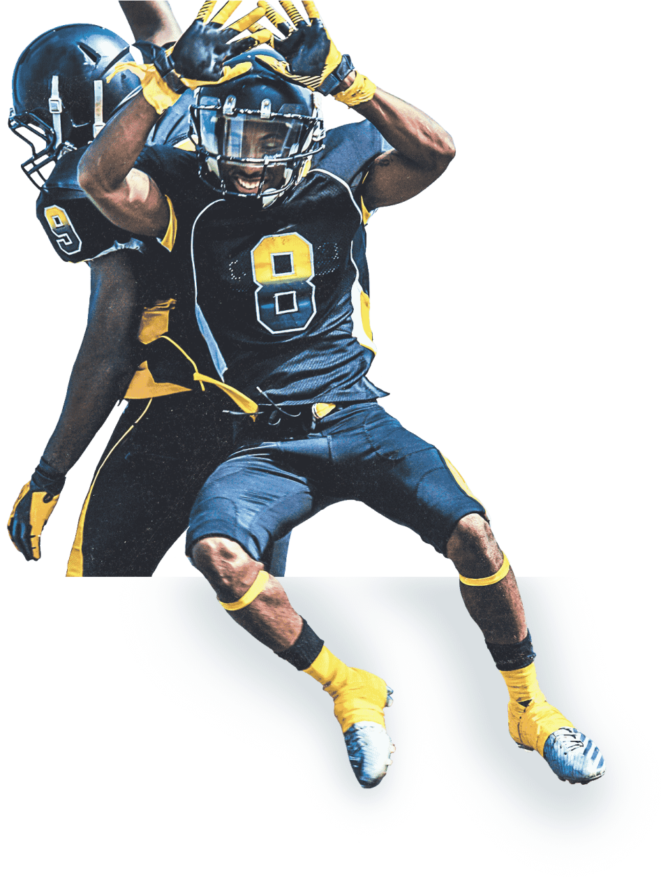 a man wearing a helmet and holding a football