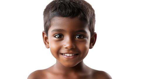 a young boy is smiling for the camera