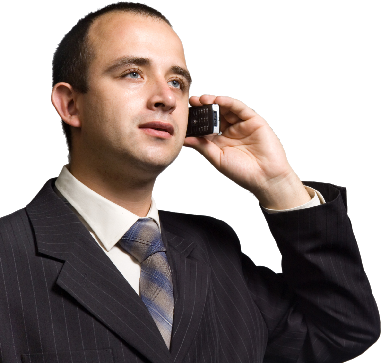 a man in a suit talking on a cell