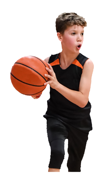 a young boy holding a basketball ball
