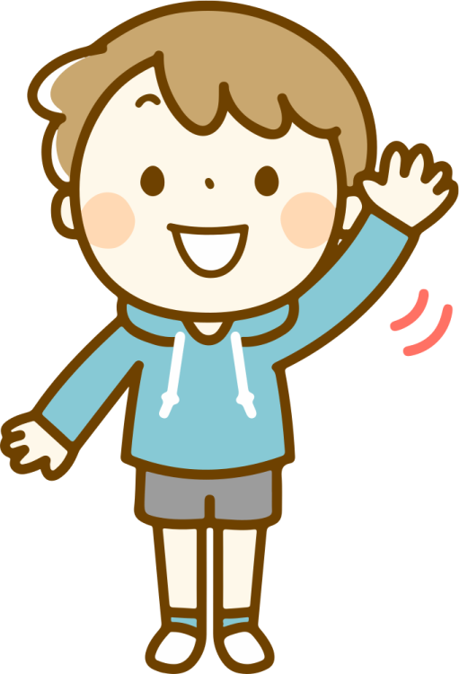 a boy in a blue shirt with his hands up
