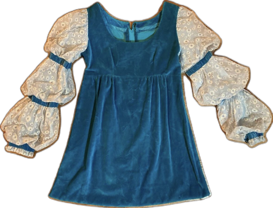 a blue velvet dress with lace sleeves and cuffs