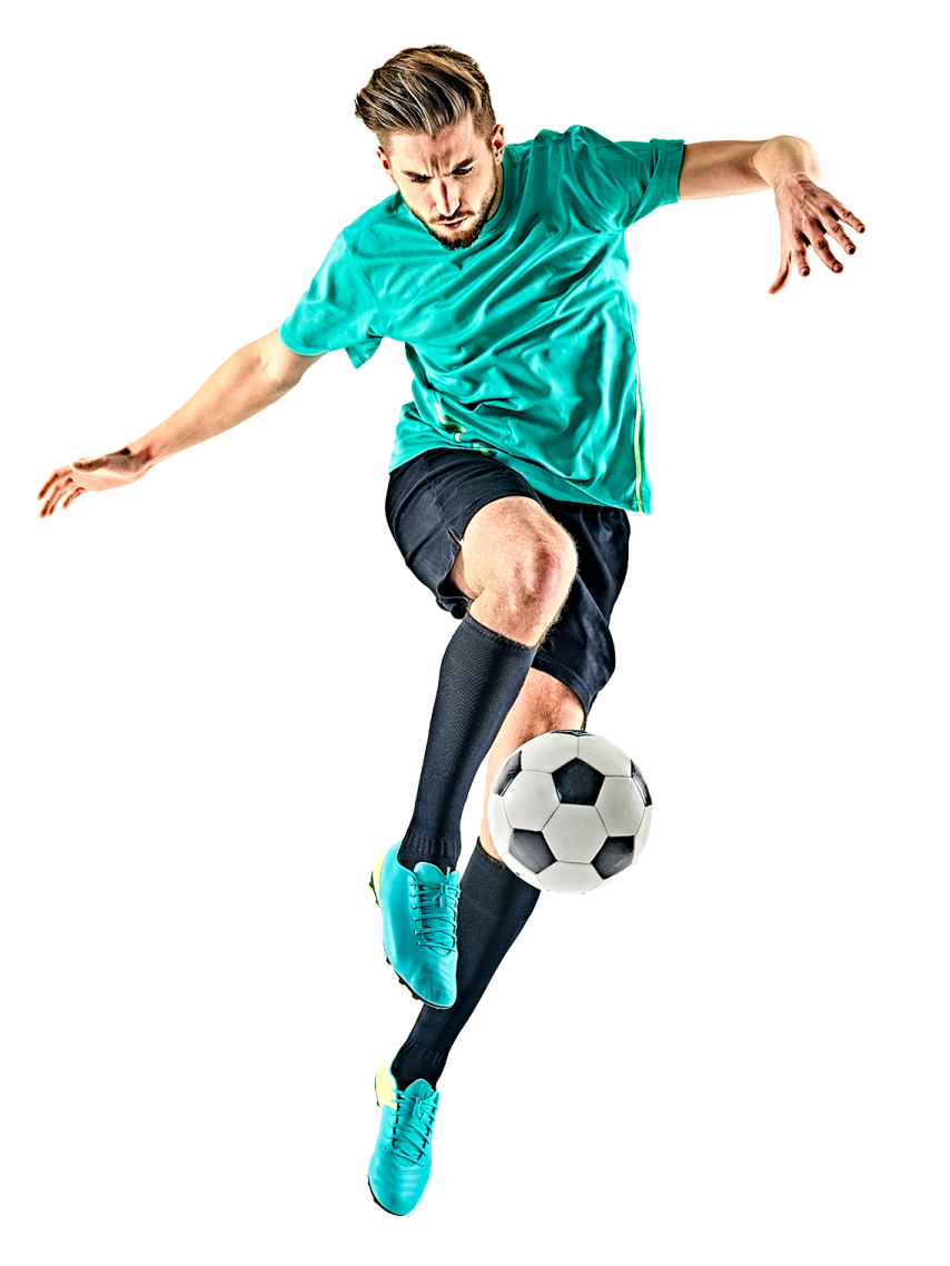 a man kicking a soccer ball in the air