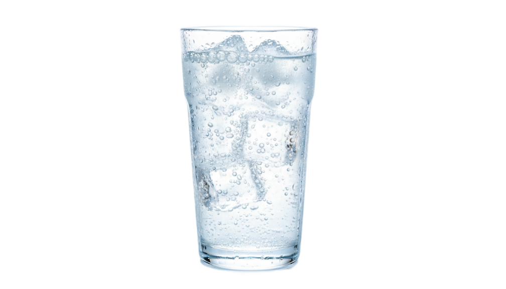 a glass filled with water on a white background