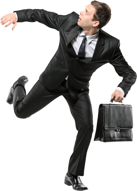 a man in a suit is jumping with his briefcase