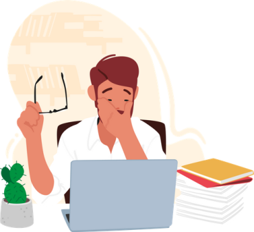 a person sitting at a desk with a laptop