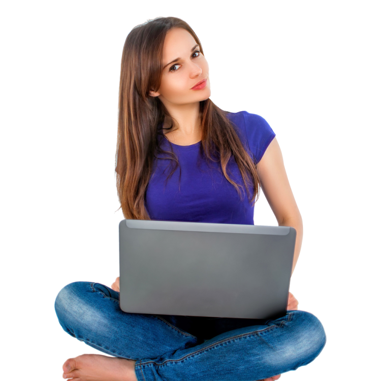 a woman sitting on the floor with her laptop