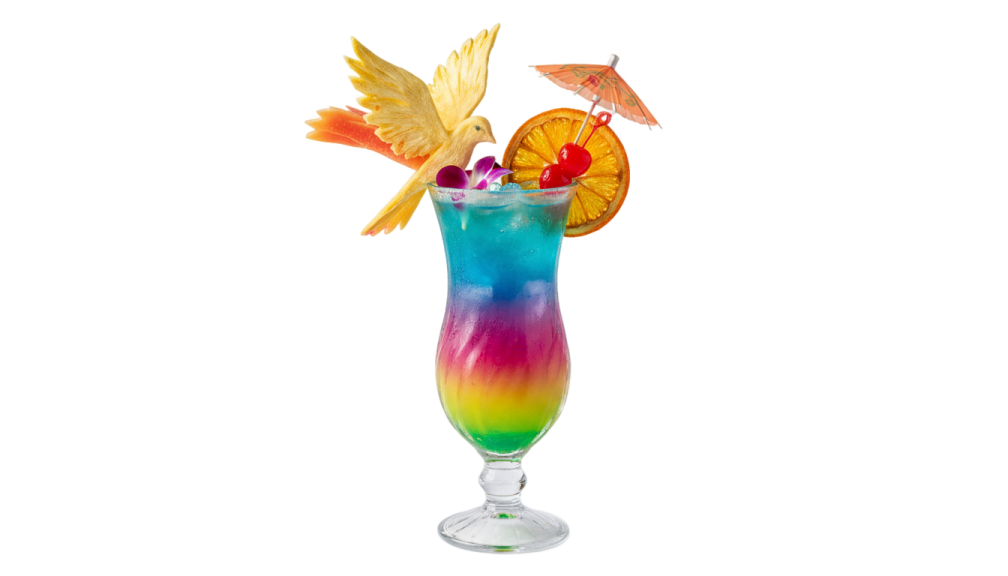 a tall glass filled with a colorful drink