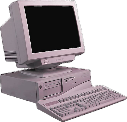 an old computer sitting on top of a desk