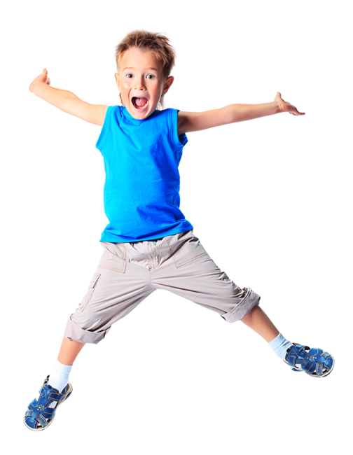 a young boy is jumping in the air