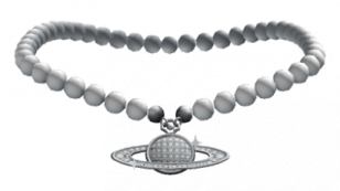 a white bea bracelet with a silver heart charm