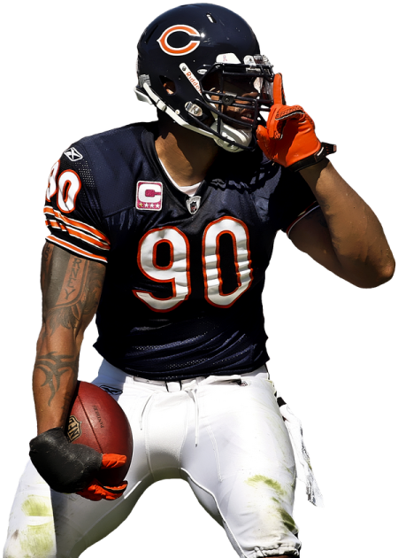 a man in a uniform holding a football ball