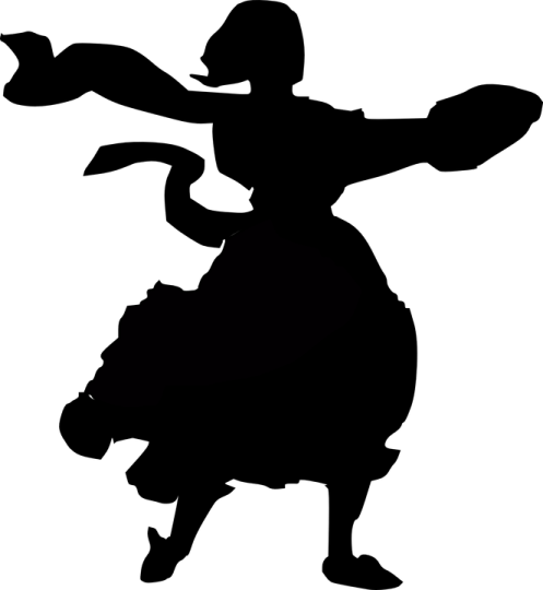 a silhouette of a woman dancing