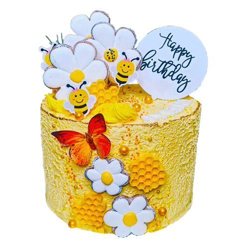 a cake decorated with bees and flowers
