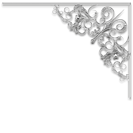 a white frame with silver swirls and scrolls on it