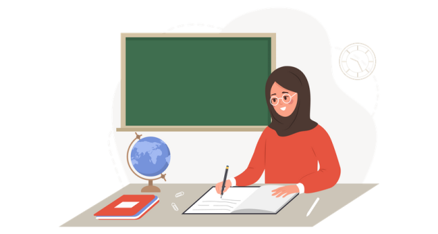 a woman sitting at a desk in front of a blackboard