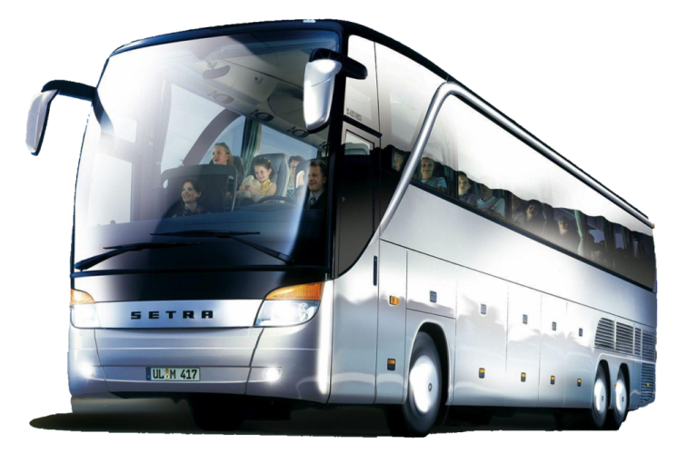 a white bus is driving down the road