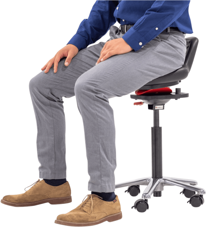 a man sitting on top of a chair