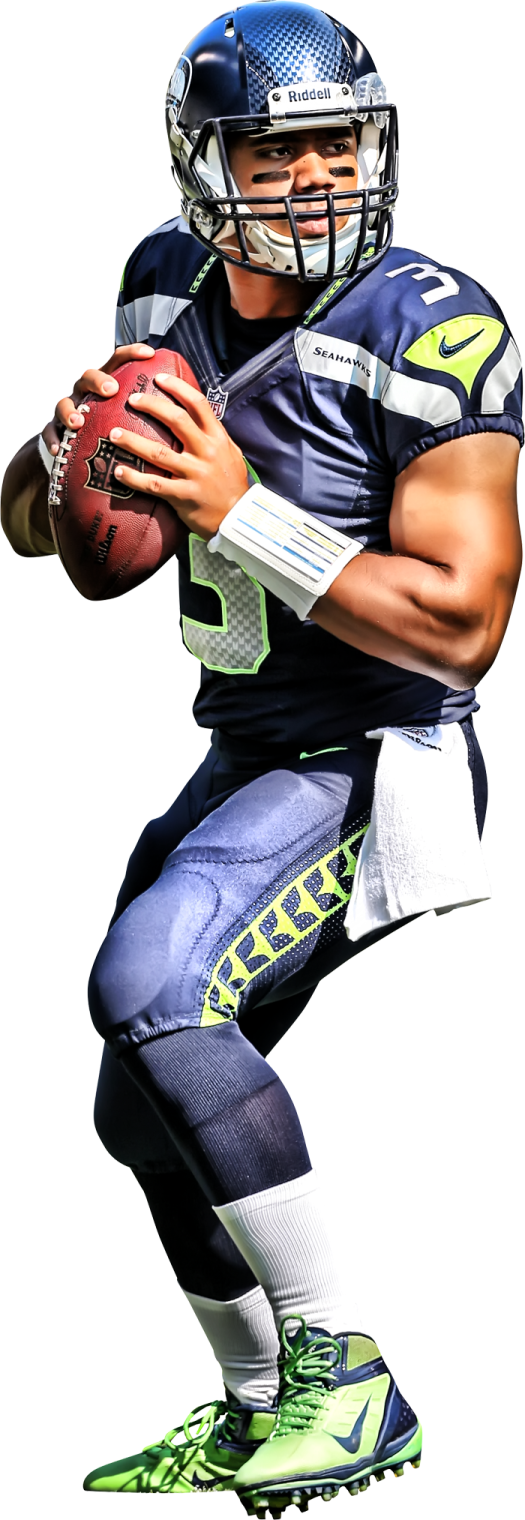 a man in a football uniform holding a ball